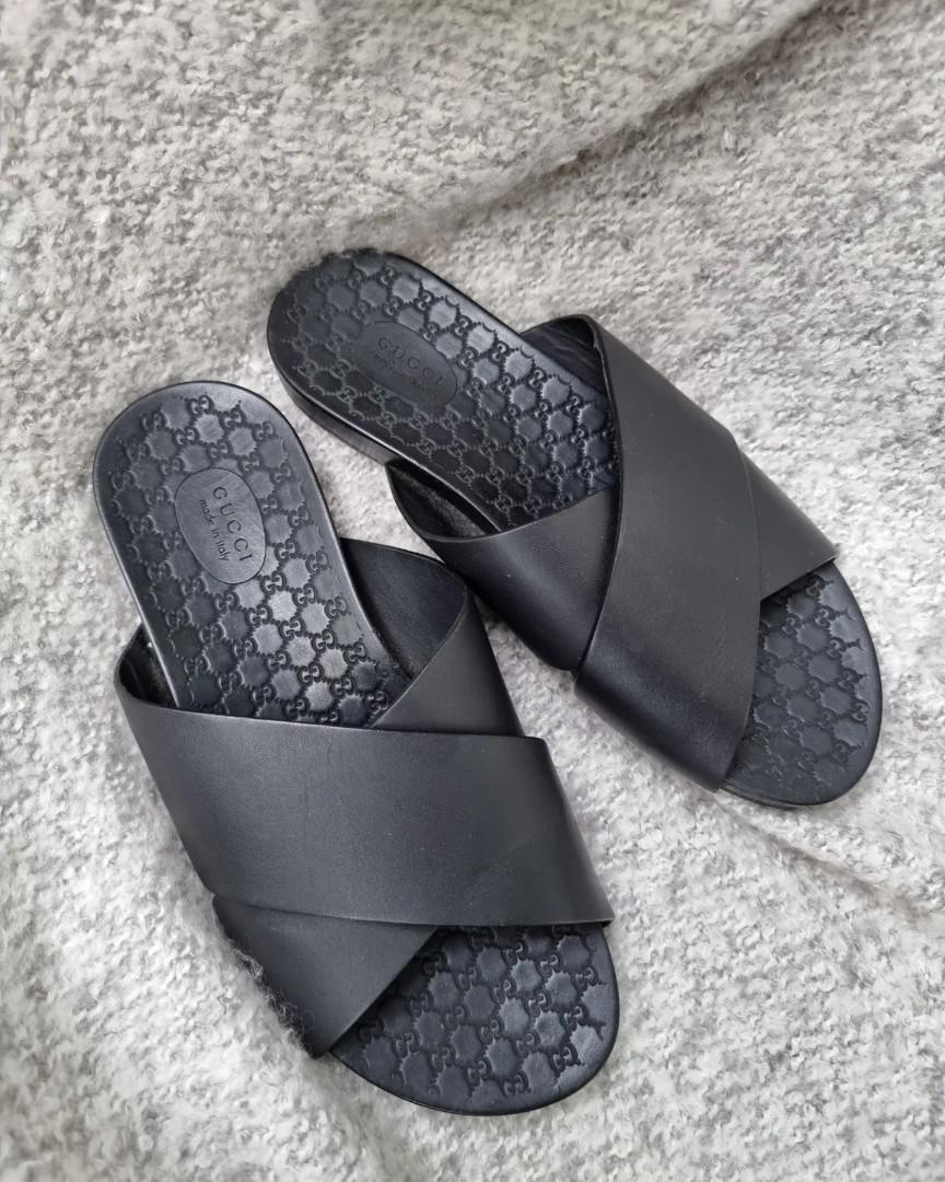 Gucci black leather slides store