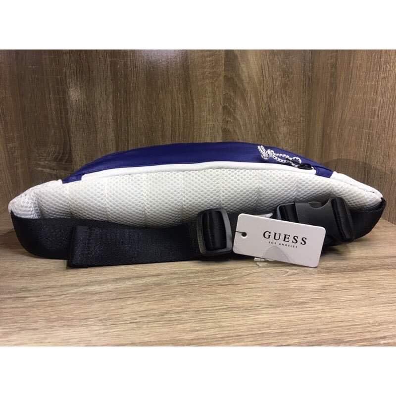Guess Champs Bum Bag (Sapphire) (Category: Belt bags, Clutches and Pouches) located in Pasig City. Submitted by brandedcollection20 (Listing ID 1188459865, Image 3). Description: 100% Brand New 100% Legit 100% Original 100% Authentic Contrast logo printed bum bag Polyester 2 main zipper compartments 1 interior zipper compartment Adjustable strap Lined interior Dimensions: L 37cm x H 12cm x W 10cm Waist drop: 46cm.
