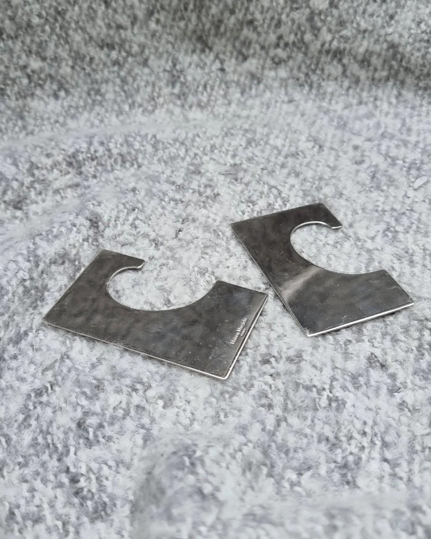 MAISON MARGIELA Silver Tone Ear Cuffs (Category: Earrings) located in Quezon City. Submitted by lolaandrogynous (Listing ID 1188574385, Image 2). Description: MAISON MARGIELA Silver Tone Ear Cuffs Comes with its original box and tags 10/10 (In NEW condition).
