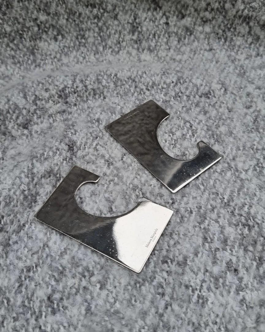 MAISON MARGIELA Silver Tone Ear Cuffs (Category: Earrings) located in Quezon City. Submitted by lolaandrogynous (Listing ID 1188574385, Image 3). Description: MAISON MARGIELA Silver Tone Ear Cuffs Comes with its original box and tags 10/10 (In NEW condition).