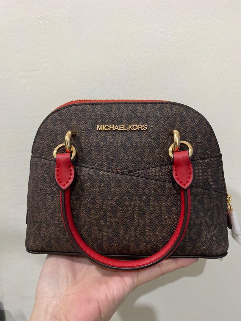 Pre loved Michael Kors mini Alma sling bag