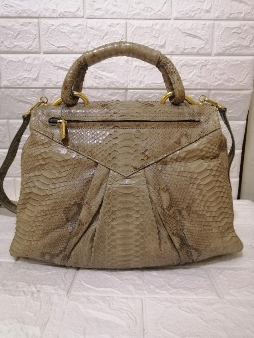 Besozzi Franco Python Leather 2-way Bag (Category: Luxury Bags & Wallets) located in Las Pinas. Submitted by etoksi1234 (Listing ID 1193695349, Image 2). Description: Pre-loved Besozzi Franco Real Python Leather 2-way Bag. Looks new. Made in Italy... Size: L - 15" (bottom) L - 10.5" (Upper) H - 9" D - 4" Please manage your expectations. All sales are final. Kindly examine pictures carefully when buying online. No return, exchange policy....