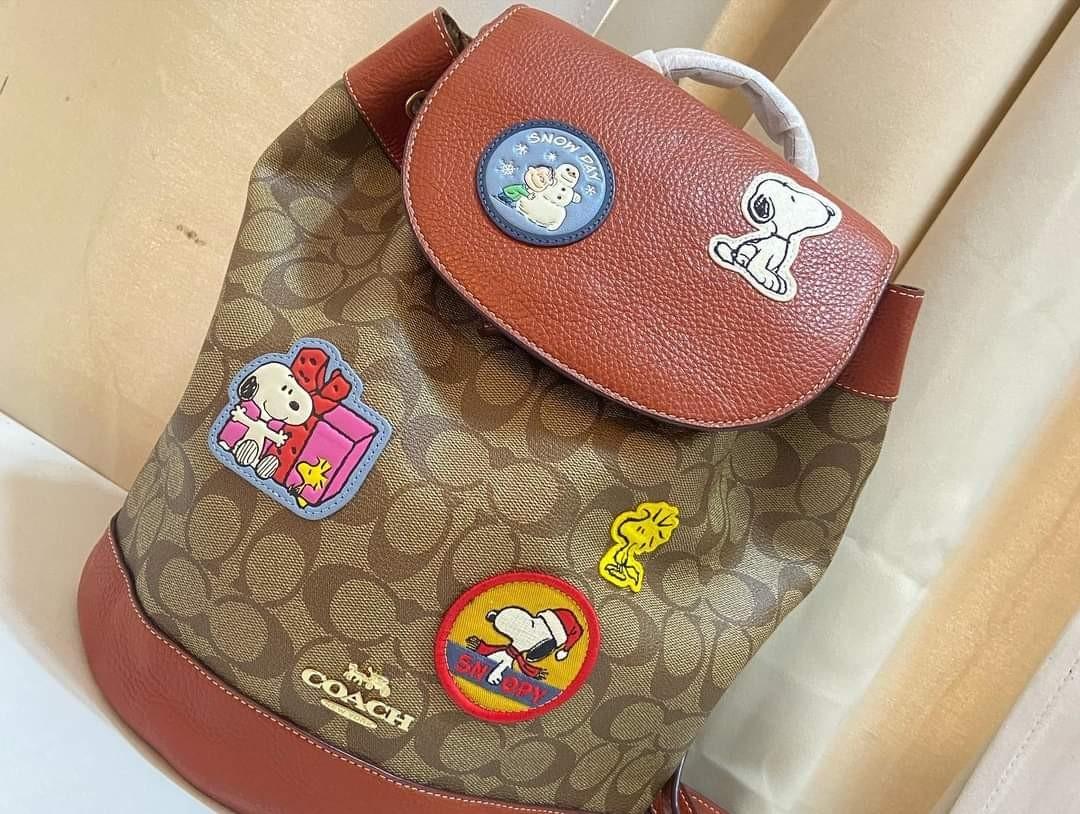 Coach X Peanuts Dempsey Drawstring Backpack In Signature Canvas With