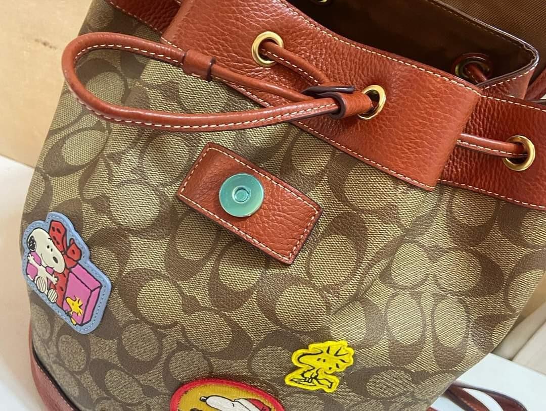 Coach X Peanuts Dempsey Drawstring Backpack In Signature Canvas With