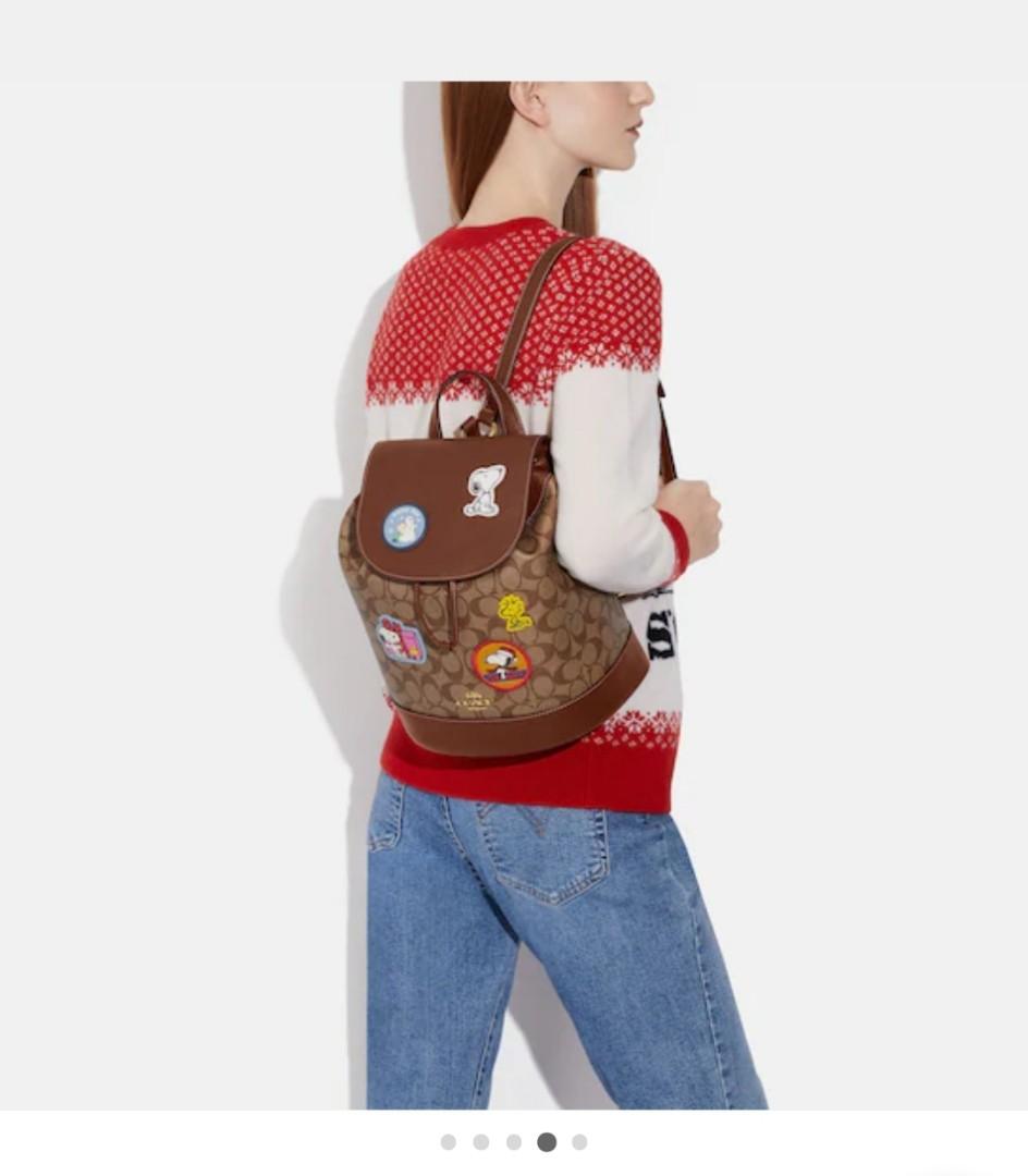 Coach X Peanuts Dempsey Drawstring Backpack In Signature Canvas With
