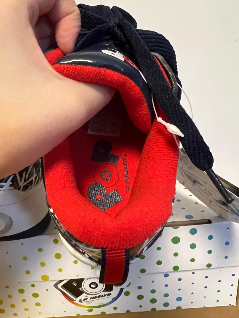 Heelys with push store button