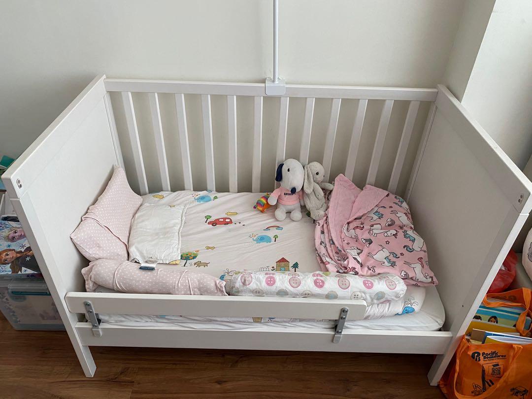 Baby crib attached store to bed ikea