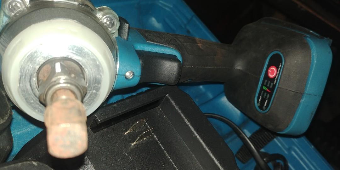 Makita impact wrench 48v (Category: Home Improvement Tools & Accessories) located in Manila. Submitted by flexi.flexi (Listing ID 1193778872, Image 3). Description: Impact wrench. 1/2 drive w hex chuck w one impact socket 22mm. 2 lithium-ion 48V 4.0ah battery, charger and carry case. used but not abused and tested. make life easier when removing tire nuts. text me 0917-321-6353.
