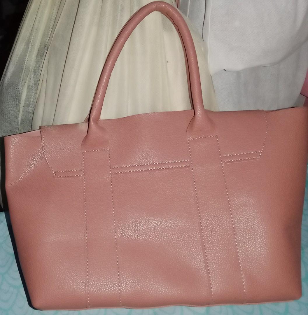 Olivia Hassler (Category: Luxury Bags & Wallets) located in Iloilo. Submitted by Exhale_Fashion (Listing ID 1193786423, Image 2). Description: Pre-loved, No issue, Good as new condition. Message me your inquiries..