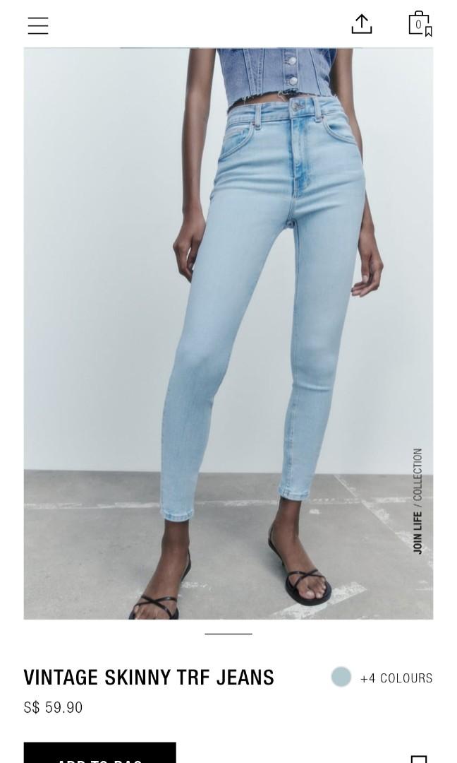 TRF RIPPED BAGGY JEANS - Light blue