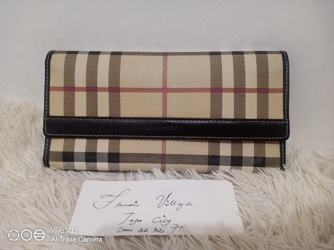 Burberry long wallet (Category: Luxury Bags & Wallets) located in Tagum. Submitted by luxbagelyas (Listing ID 1193797794, Image 1). Description: Good condition with sign of use long wallet.