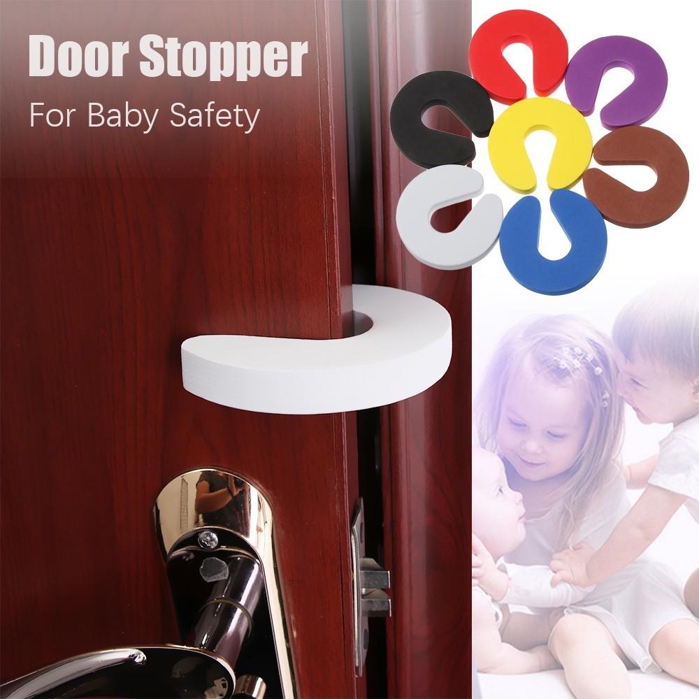 Child safety door store stopper