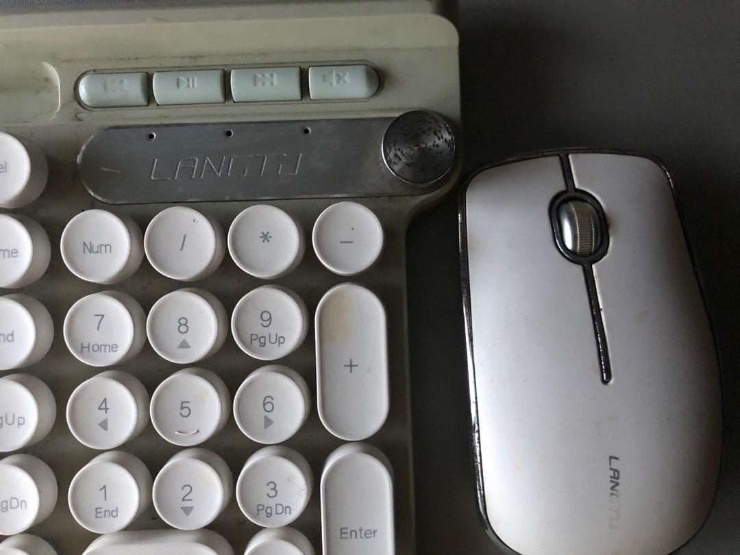Langtu Bluetooth Keyboard and mouse (Category: Computer Keyboard) located in Paranaque City. Submitted by thewitchatmidnight (Listing ID 1193884595, Image 2). Description: Langtu LT500 Bluetooth Keyboard and Mouse No issues. Doesn’t come with a charger. Needs android charger for charging and needs slight dusting. All keys are detachable. It comes with a small usb bluetooth thingy for the keyboard and mouse to work it is attached and can be found 