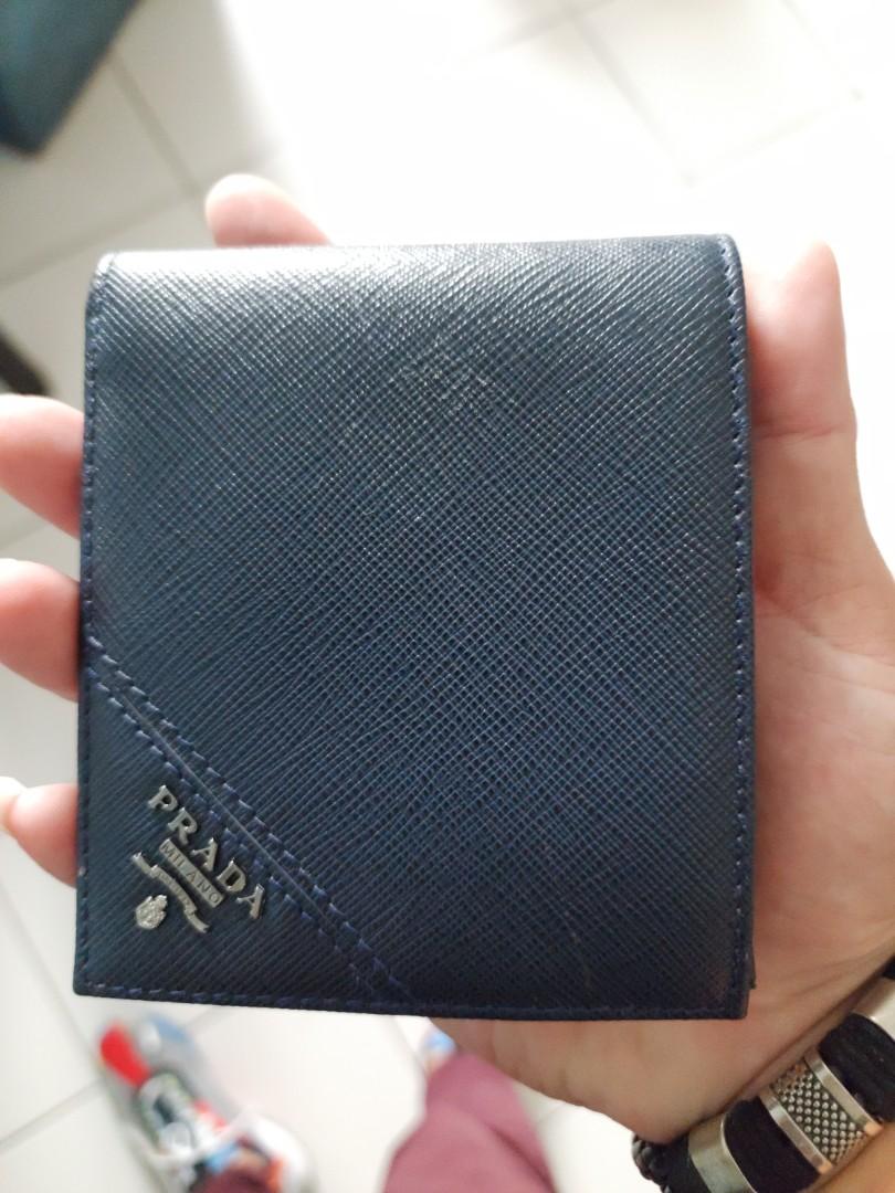 Prada plaque logo wallet, Luxury, Bags & Wallets on Carousell