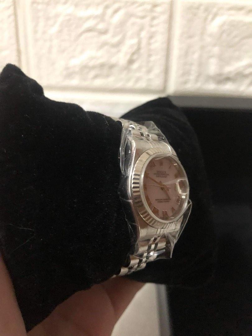 Rolex 2000 Datejust MOP dial 26mm (Category: Luxury Watches) located in Pasig City. Submitted by Watchaholics (Listing ID 1193960931, Image 2). Description: Rolex Datejust 26mm 79174NR Pink MOP Dial P Series; Year 2000 Watch, original paper, tags and extra links Comes with presentation box 295k.