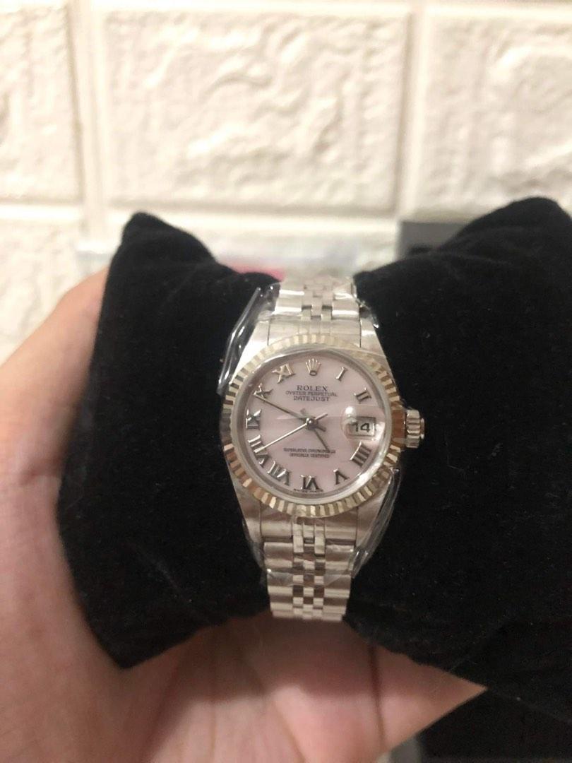 Rolex 2000 Datejust MOP dial 26mm (Category: Luxury Watches) located in Pasig City. Submitted by Watchaholics (Listing ID 1193960931, Image 1). Description: Rolex Datejust 26mm 79174NR Pink MOP Dial P Series; Year 2000 Watch, original paper, tags and extra links Comes with presentation box 295k.