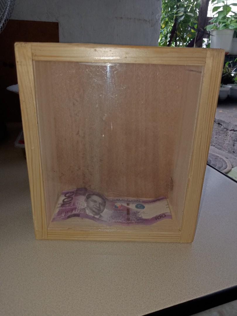 Wooden Savings alkansya (Category: Handmade Craft) located in Quezon City. Submitted by smytine (Listing ID 1193969661, Image 1). Description: Handmade wooden alkansya. Pwede magrequeast ng sizes. For as low as 150 pesos., Tara at magipon na ulit 😊 pwede souvenirs and gifts., 🎁💝.