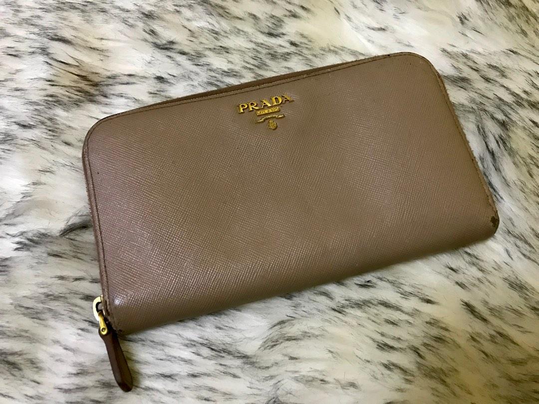 Authentic Prada Saffiano Round Zipper Wallet, Luxury, Bags & Wallets on  Carousell