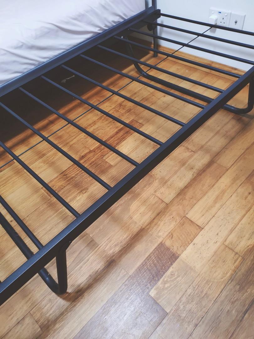 Metal pull out bed frame with fold out legs, Furniture & Home Living