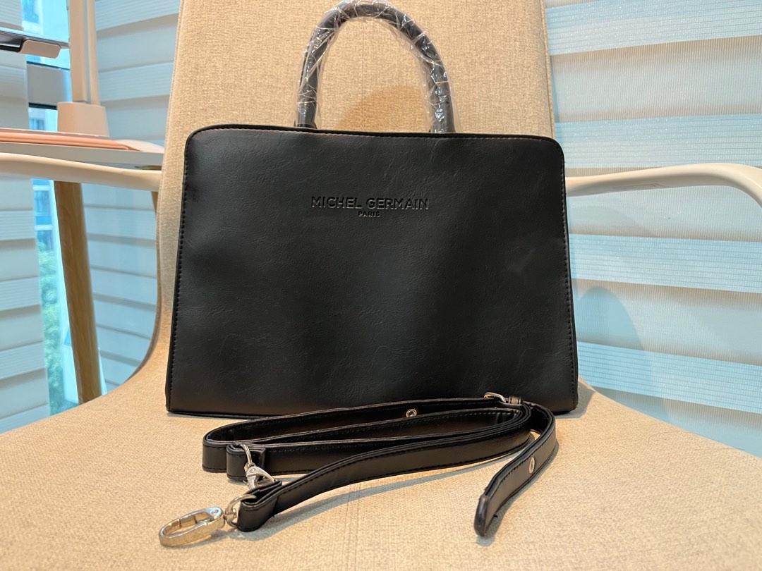 Michel germain duffle bag store