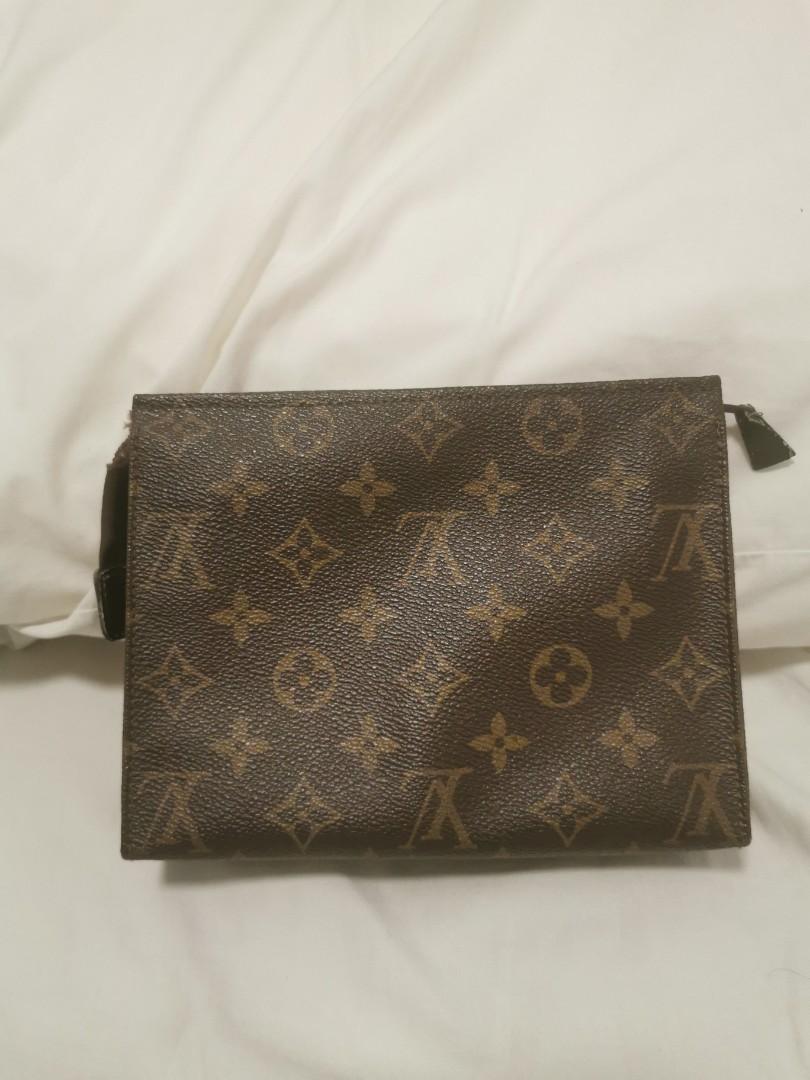 Preloved LOUIS VUITTON Toiletry Pouch 19 Monogram (Category: Luxury Bags & Wallets) located in Rizal. Submitted by k.torres (Listing ID 1188675569, Image 2). Description: Closure: Zip closure with leather tab Size (in inches): 7.5 x 5.9 x 2 inches Size (in cm): 19x 15 x 6 cm Material: Canvas With code Flaw: replaced zipper puller & leather tab (see photos) No inclusions Bought from trusted seller but please self-authenticate also. .