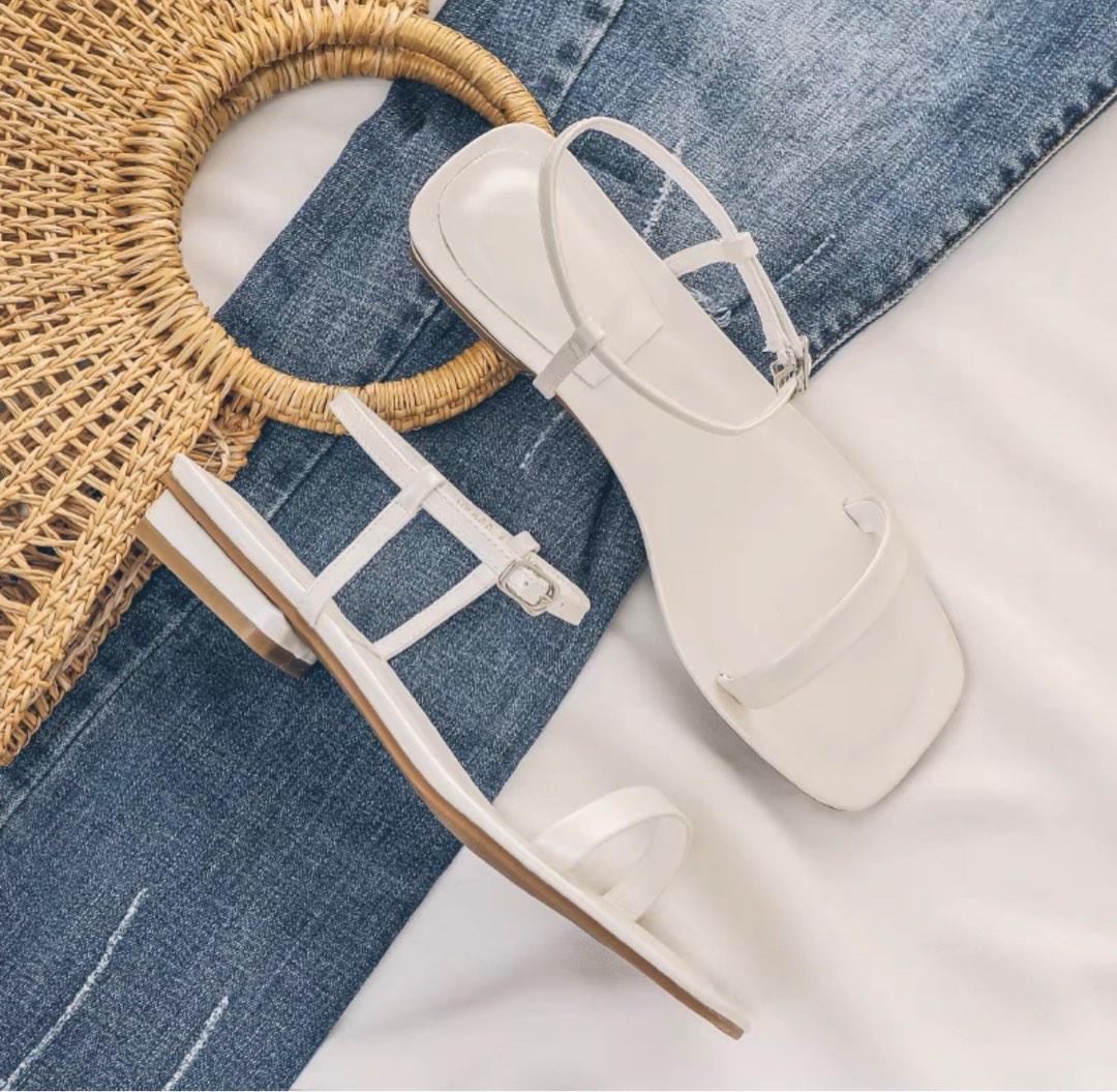 white and tan sandals