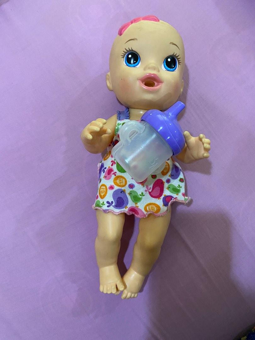 Baby Alive Sip N Cuddle (Category: Kids Toys) located in Quezon City. Submitted by shopaholic_rach (Listing ID 1188810747, Image 1). Description: Preloved but in good condition. We never played it with water MOP BDO/GCash Buyer shoulders shipping fee Shipping via Grab/Lalamove Ships from QC.