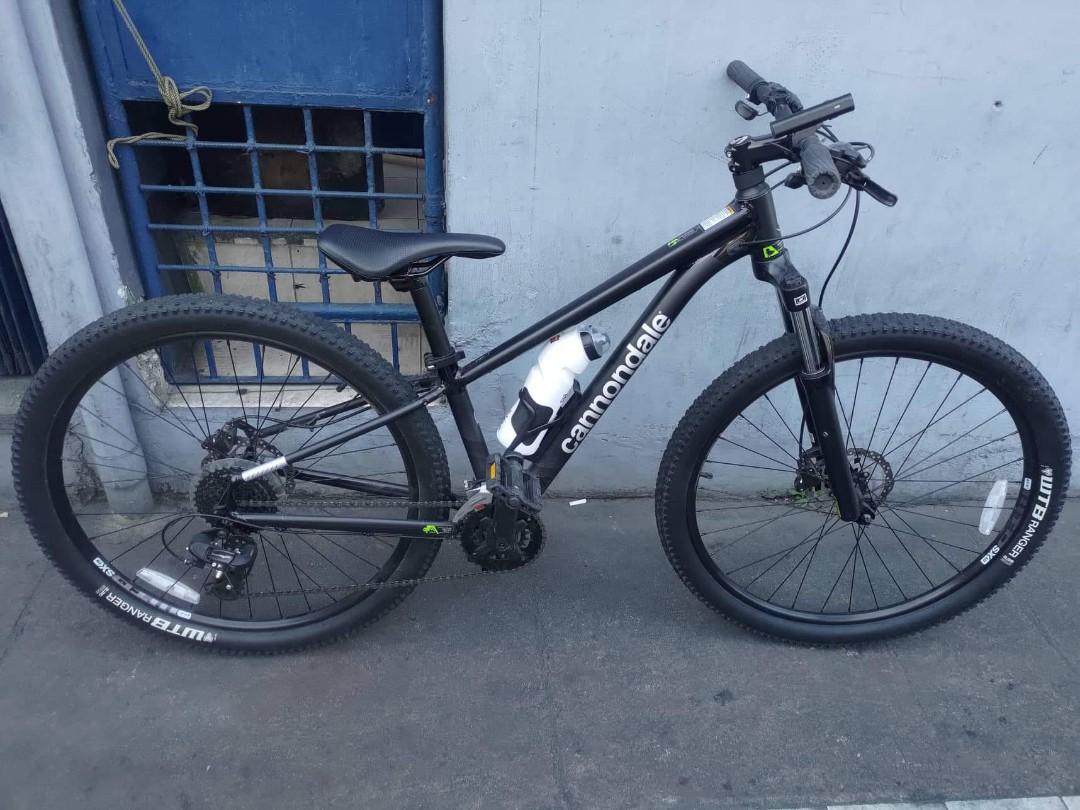 Cannondale trail 7 XS for 5'3 below (Category: Bicycles) located in Marikina City. Submitted by tintintin3 (Listing ID 1188790252, Image 2). Description: Cannondale trail 7 (All-Black) Kakabili lang 2021 Aug Tourney TX RD 2x8 speed (smooth-er shifting than tourney groupset) Zefal bottle cage XS good for 5'3 below All stock except rigid steel fork and oury grips (Stock fork, Suntour fork included) Super kinis ng frame kasi may bike skin since day1