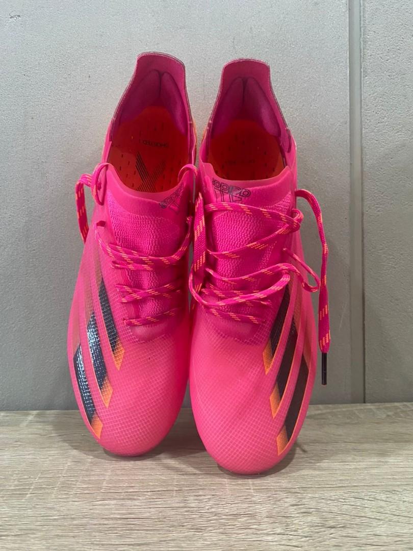Baby pink adidas football boots top