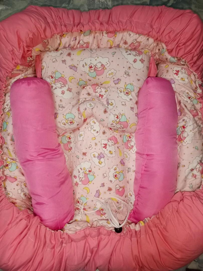 Baby Bed Nest Comforter (Category: Bed Guards) located in Makati City. Submitted by Prettykids (Listing ID 1189140541, Image 1). Description: BRANDNEW BABY BED NEST with 2 Bolster pillow and Baby pillow WHAT YOU SEE IS WHAT YOU GET 🙂 GIVEN AS GIFT BUT NEVER BEEN USED SUPER GANDA AND LAMBOT 😍🥹 SUPER COTTON ANG FABRIC SELLING FOR 1,150 FOR PICK UP ONLY GRAB/LALAMOVE ITEM IS A BIT BULKY LOC:MAKATI CITY MOP:GCASH.