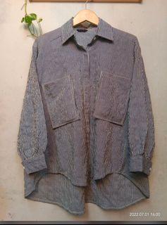 Kemeja salur oversize