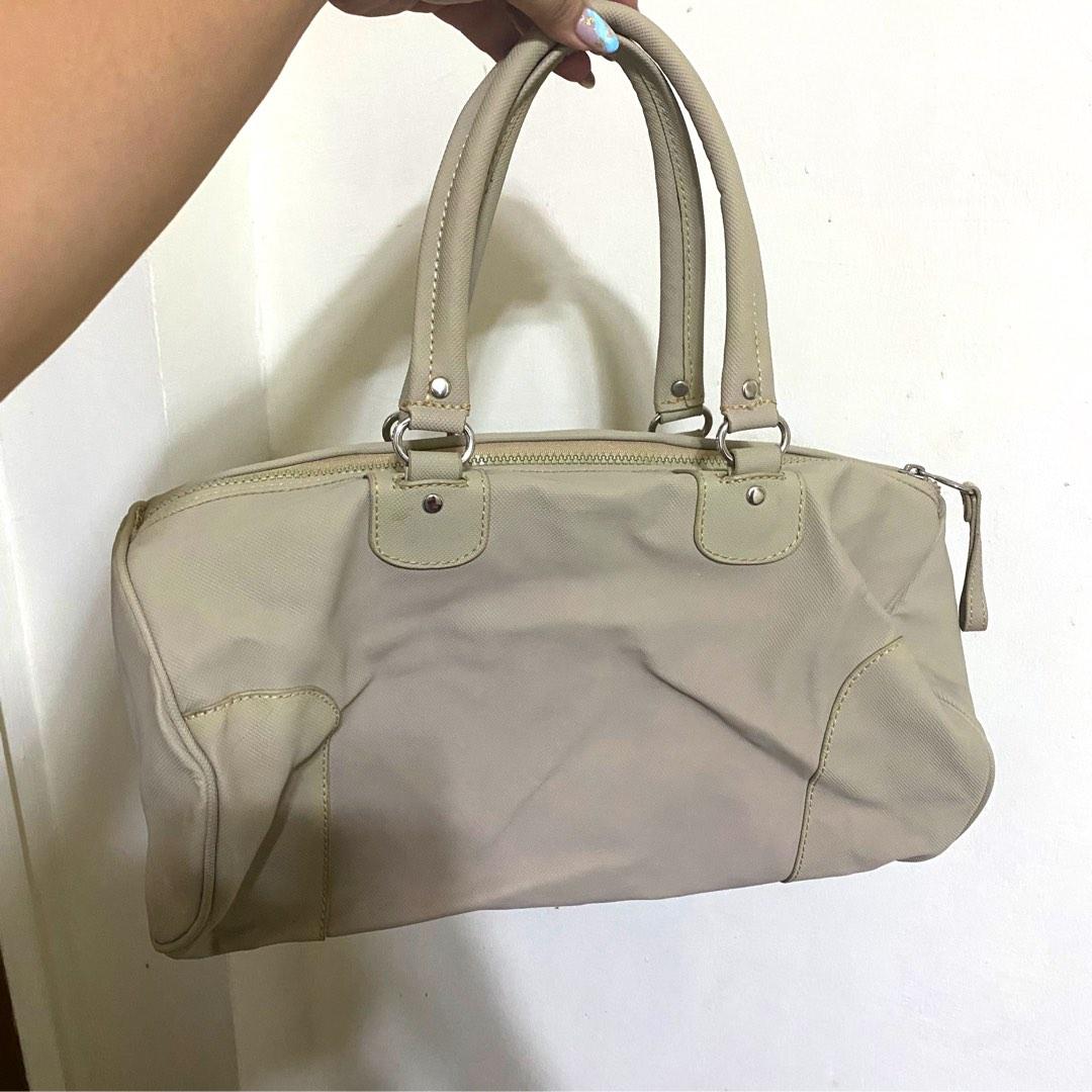 Vintage Lacoste Roll Bag Off White, Luxury, Bags & Wallets on Carousell