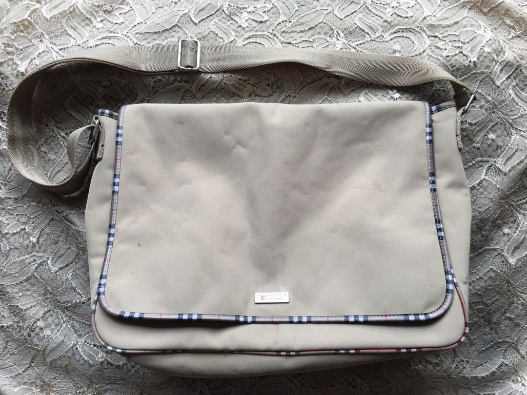 Burberry Fragrance Messenger Bag (Category: Sling Bags) located in Marikina City. Submitted by arrveefm (Listing ID 1189204523, Image 1). Description: Original Burberry Fragrance Messenger Bag Heavily USED, kindly refer to pictures. Fixed Selling Price: Php 850.00 (Shipping NOT YET included; Php 200 via JRS) Visible scratches/minor cuts on fabric, care tag inside heavily scratched, visible ink stains, minor visible rust on all metal due to age; r