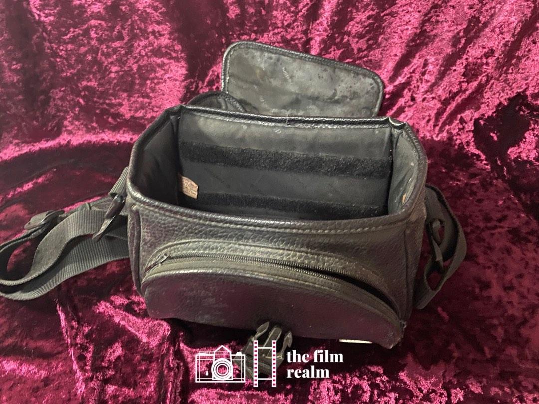 FIRSTLINE BRAND LEATHER PADDED VINTAGE CAMERA BAG (Category: Camera Bags & Carriers) located in Antipolo. Submitted by jeweltangi_ (Listing ID 1189278733, Image 2). Description: FIRSTLINE BRAND LEATHER PADDED VINTAGE CAMERA BAG - Good condition - Cosmetics: 7/10; minor scuffs in the exterior and slightly discolored interior Bag specifications: - Room for a camera and 2-3 lens and accessories - Adjustable padded strap and leather padded handle - S