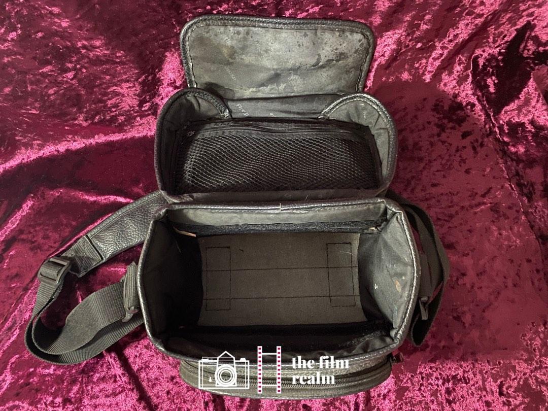 FIRSTLINE BRAND LEATHER PADDED VINTAGE CAMERA BAG (Category: Camera Bags & Carriers) located in Antipolo. Submitted by jeweltangi_ (Listing ID 1189278733, Image 3). Description: FIRSTLINE BRAND LEATHER PADDED VINTAGE CAMERA BAG - Good condition - Cosmetics: 7/10; minor scuffs in the exterior and slightly discolored interior Bag specifications: - Room for a camera and 2-3 lens and accessories - Adjustable padded strap and leather padded handle - S
