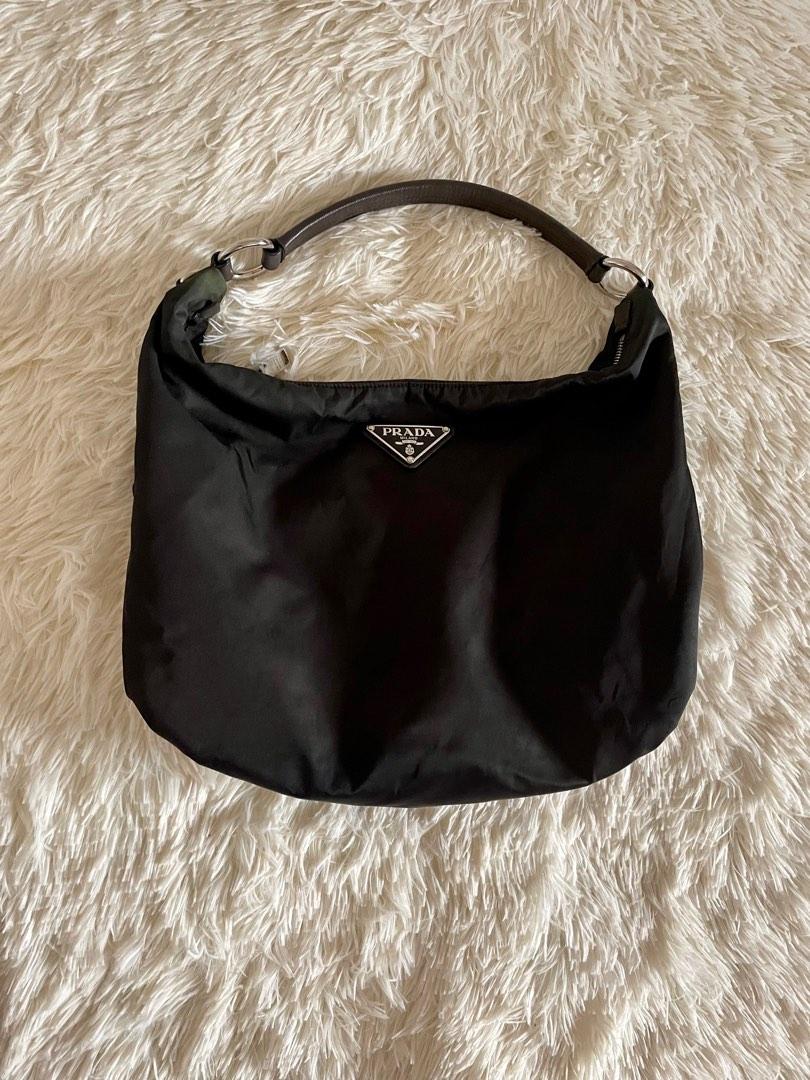 Prada bag (Category: Luxury Bags & Wallets) located in Solano. Submitted by Brands.by.Grace (Listing ID 1189176763, Image 1). Description: Authentic Prada bag Original color army green - Dyed black.