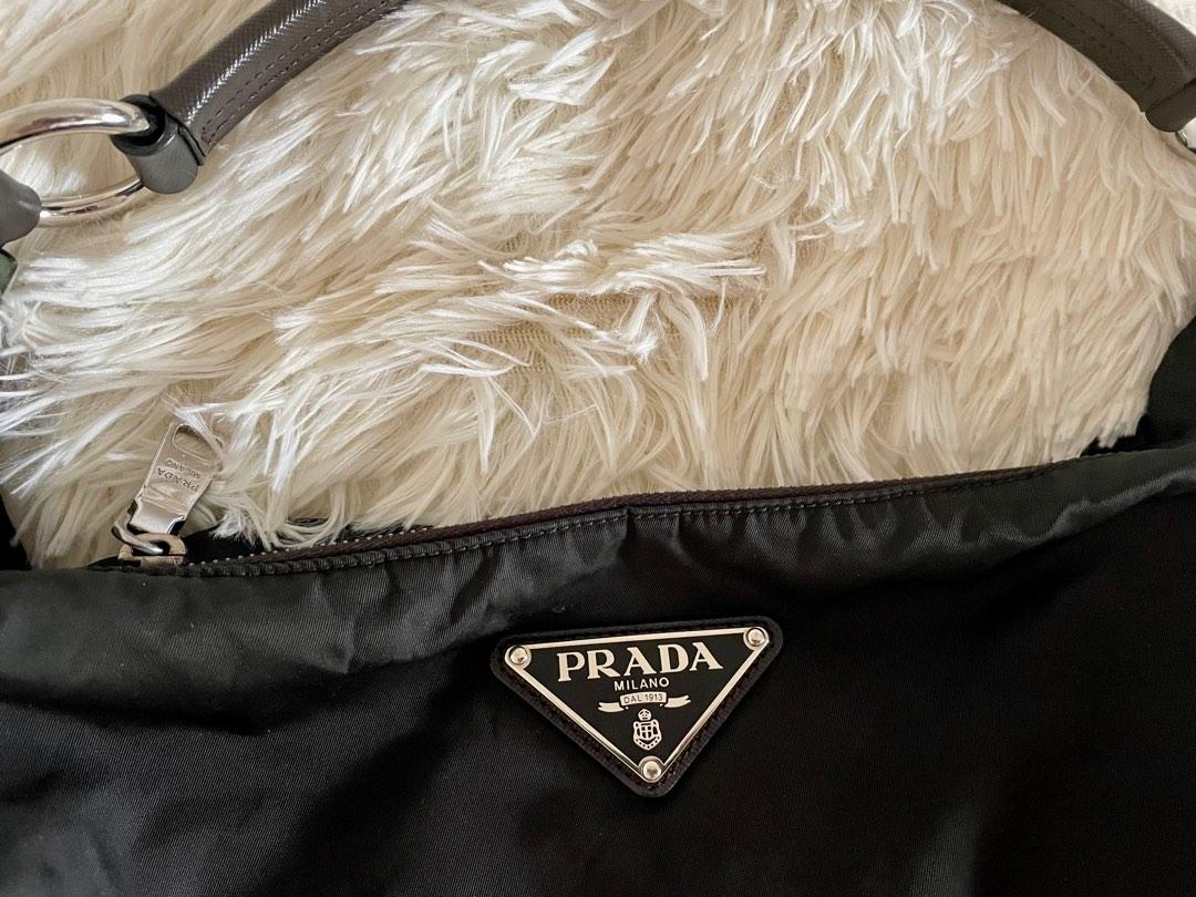Prada bag (Category: Luxury Bags & Wallets) located in Solano. Submitted by Brands.by.Grace (Listing ID 1189176763, Image 2). Description: Authentic Prada bag Original color army green - Dyed black.