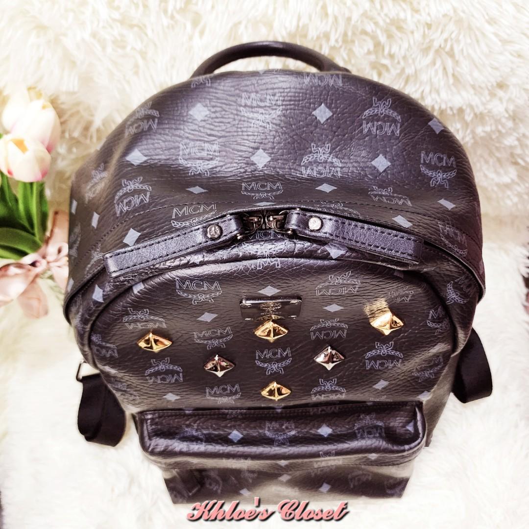 Sold at Auction: MCM Black Coated Canvas Studs Star Backpack, with gold and  silver hardware, the interior of the bag lined in black monogram nylon, w