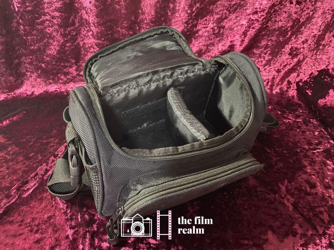 R CAMERA BRAND PADDED VINTAGE CAMERA BAG (Category: Camera Bags & Carriers) located in Antipolo. Submitted by jeweltangi_ (Listing ID 1189277951, Image 2). Description: R CAMERA BRAND PADDED VINTAGE CAMERA BAG - Good condition - Cosmetics: 7.5/10; minor stains but can be cleaned Bag specifications: - Room for a camera and 1 small lens or accessory - Removable, adjustable padded strap and padded handle - Huge front zipped pouch and 2 side pockets 