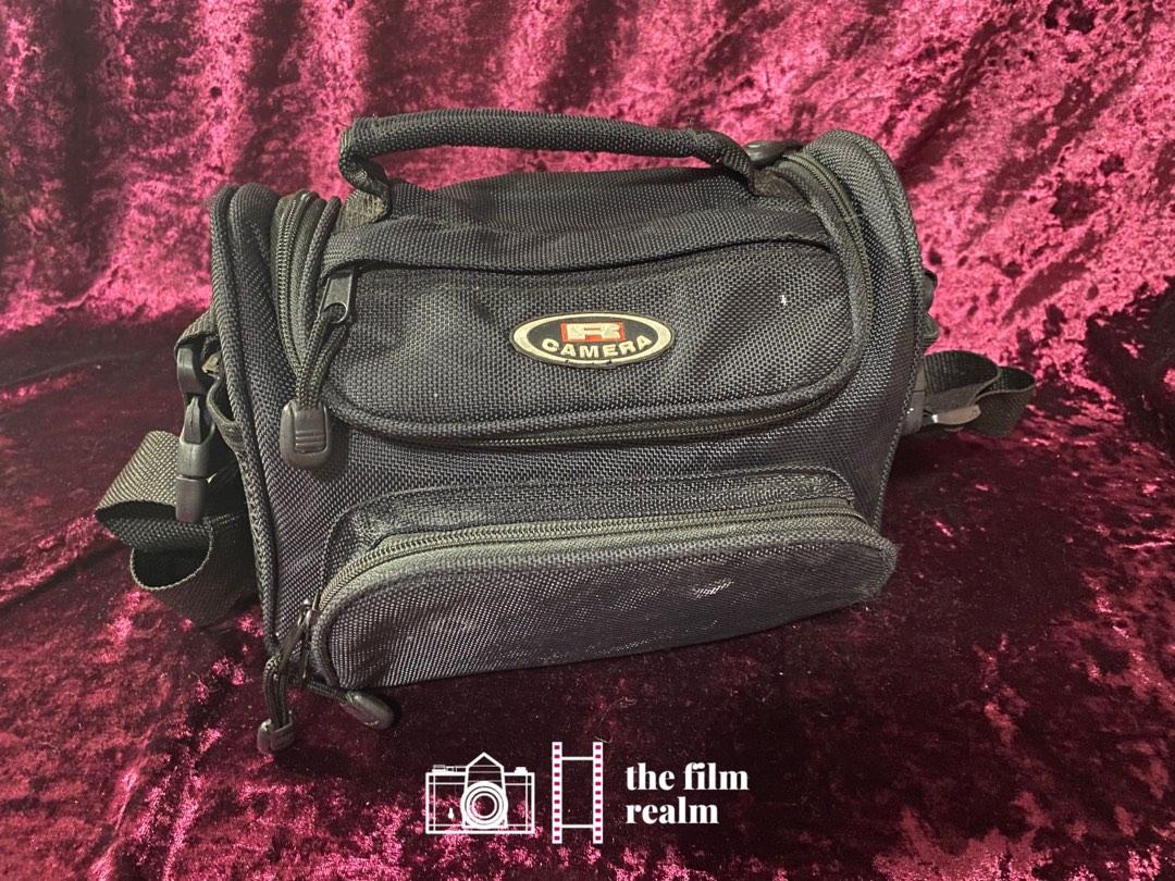 R CAMERA BRAND PADDED VINTAGE CAMERA BAG (Category: Camera Bags & Carriers) located in Antipolo. Submitted by jeweltangi_ (Listing ID 1189277951, Image 1). Description: R CAMERA BRAND PADDED VINTAGE CAMERA BAG - Good condition - Cosmetics: 7.5/10; minor stains but can be cleaned Bag specifications: - Room for a camera and 1 small lens or accessory - Removable, adjustable padded strap and padded handle - Huge front zipped pouch and 2 side pockets 