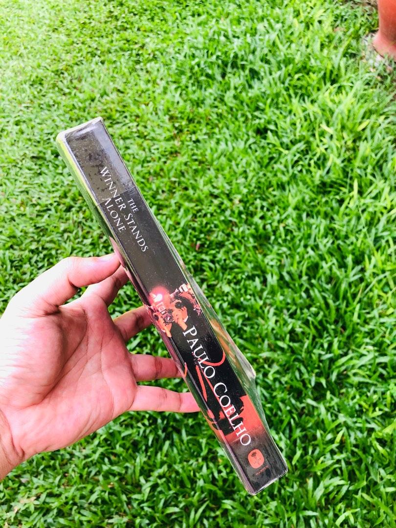 The Winner Stands Alone bu Paulo Coelho (Category: Storybooks) located in Makati City. Submitted by Book_Shop_MNL (Listing ID 1189178062, Image 2). Description: Price is negotiable. Shipping to be shouldered by the buyer. Payment via GCash or BPI Funds Transfer. Message away! 🥰.