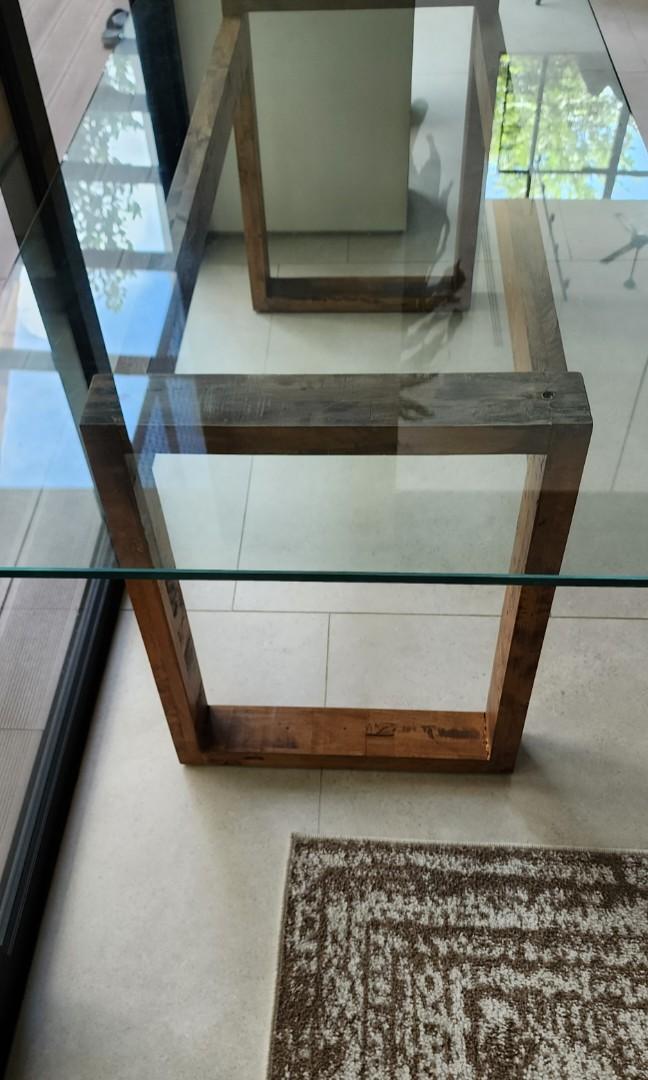 Dining Table (Category: Tables & Sets) located in Singapore. Submitted by sellthingthong (Listing ID 1189385055, Image 2). Description: Tempered glass top with wood legs. C&C..