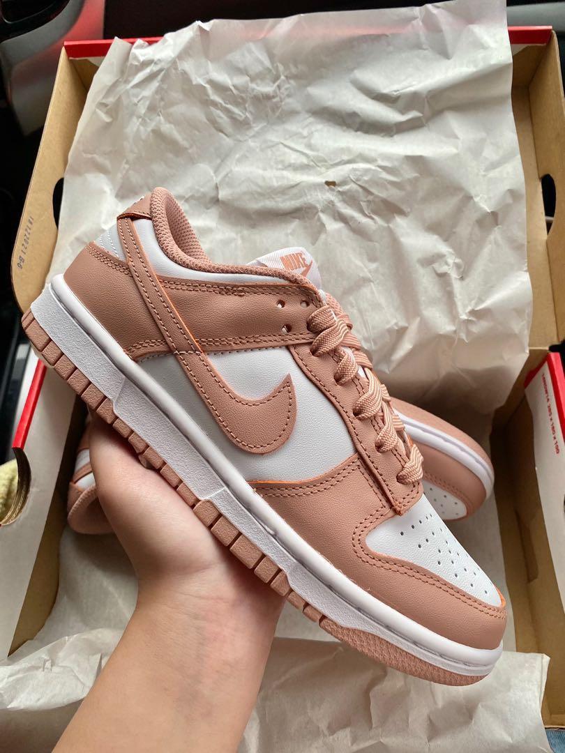 nike with a rose