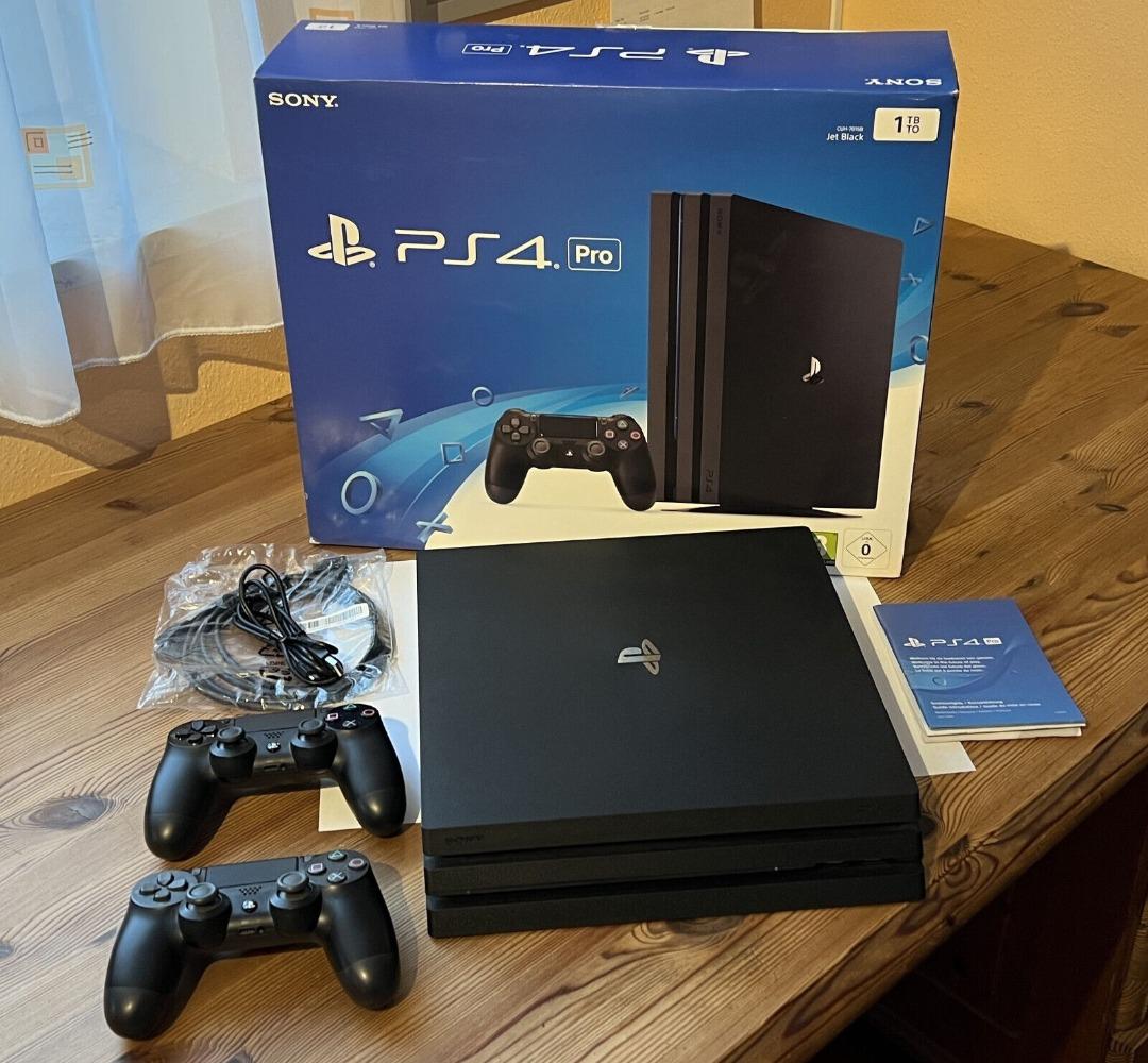 Sony PlayStation 4 Pro 1TB CUH 7016B with 2 Orig. controllers