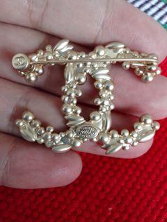 Chanel brooch with markings