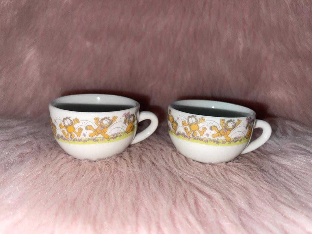 Garfield ceramic mini cup (Category: Coffee & Tea Tableware) located in Quezon City. Submitted by katsu.ct (Listing ID 1189630315, Image 1). Description: 150 for 2 / sold as set GARFIELD 1978 pre-owned collection Good condition. As is. Please check all photos..
