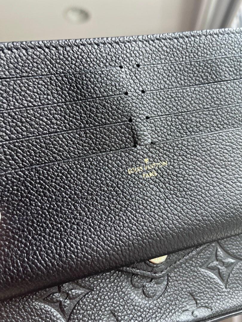 Louis Vuitton Empreinte Felicia navy leather shoulder bag, Luxury