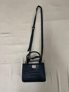 Mini black handbag with sling