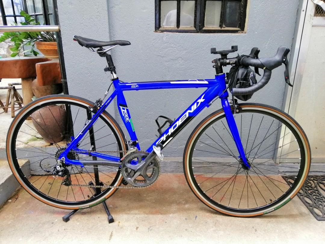 Phoenix swift best sale road bike specs