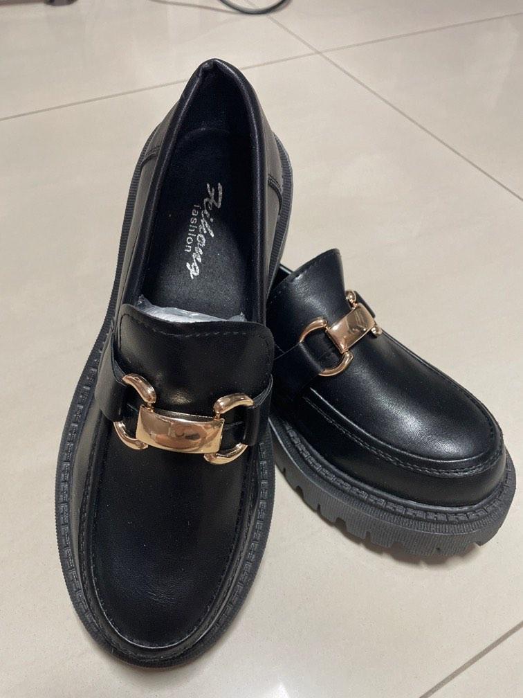 Platform loafers in black gold